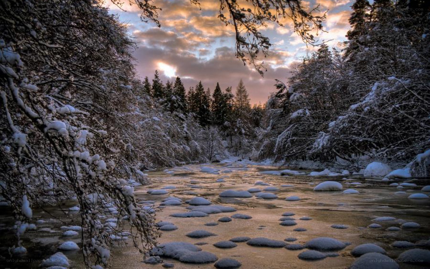 Snowy river at sunset