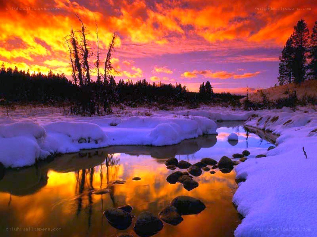 Snowy river at sunset