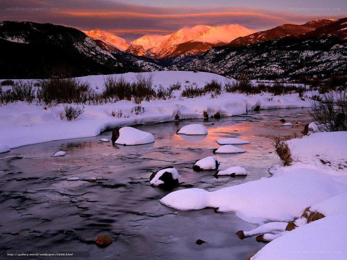 Snowy river at sunset