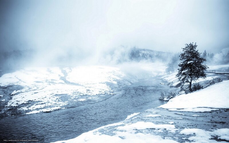 Snowy river in mist