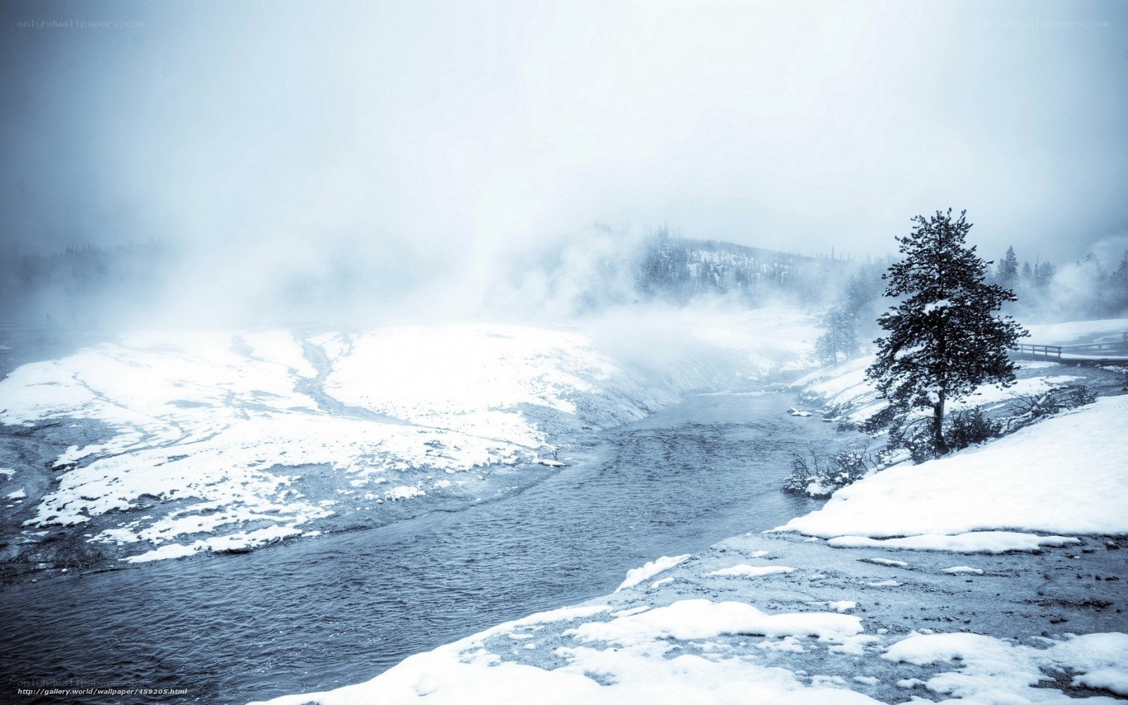 Snowy river in mist