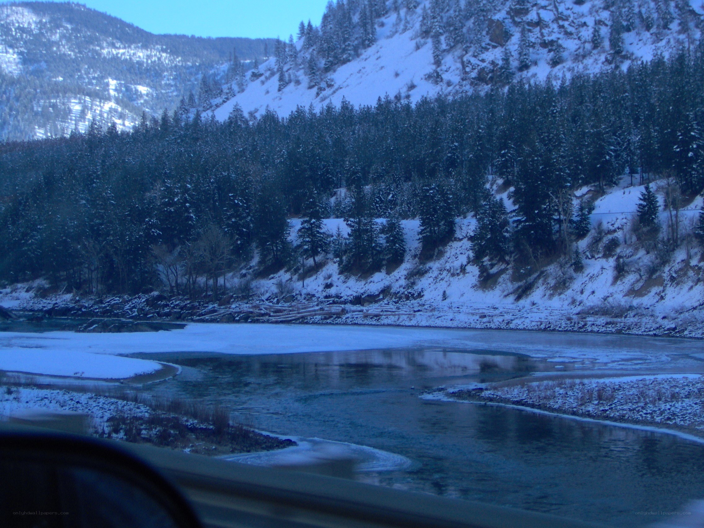 snowy river in mountain valley