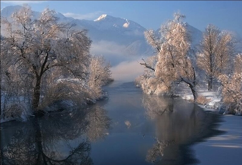Snowy river in mountain valley