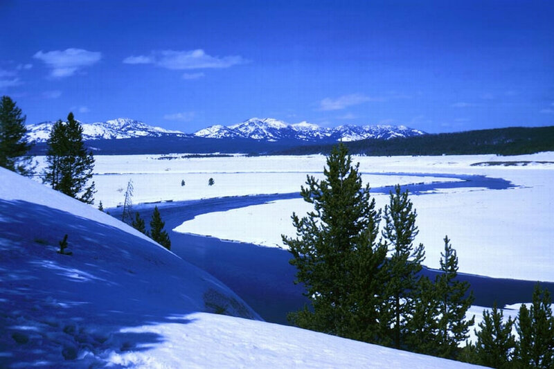 snowy river in mountain valley