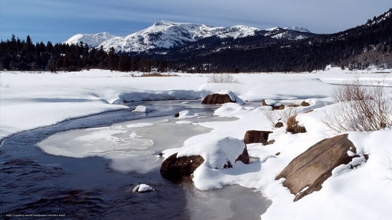 snowy river in mountain valley