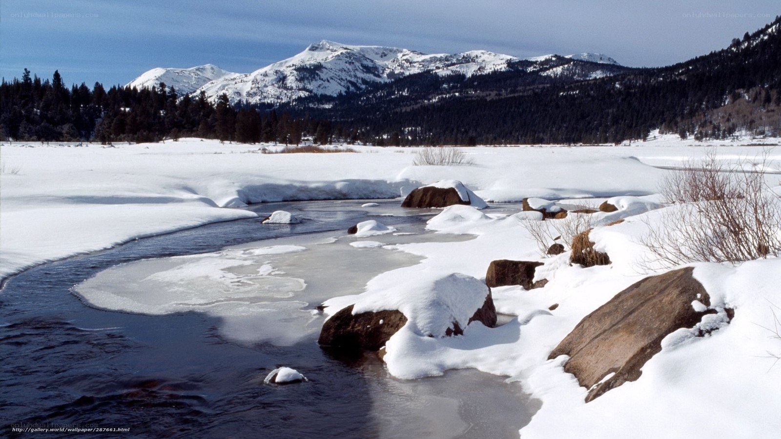 snowy river in mountain valley
