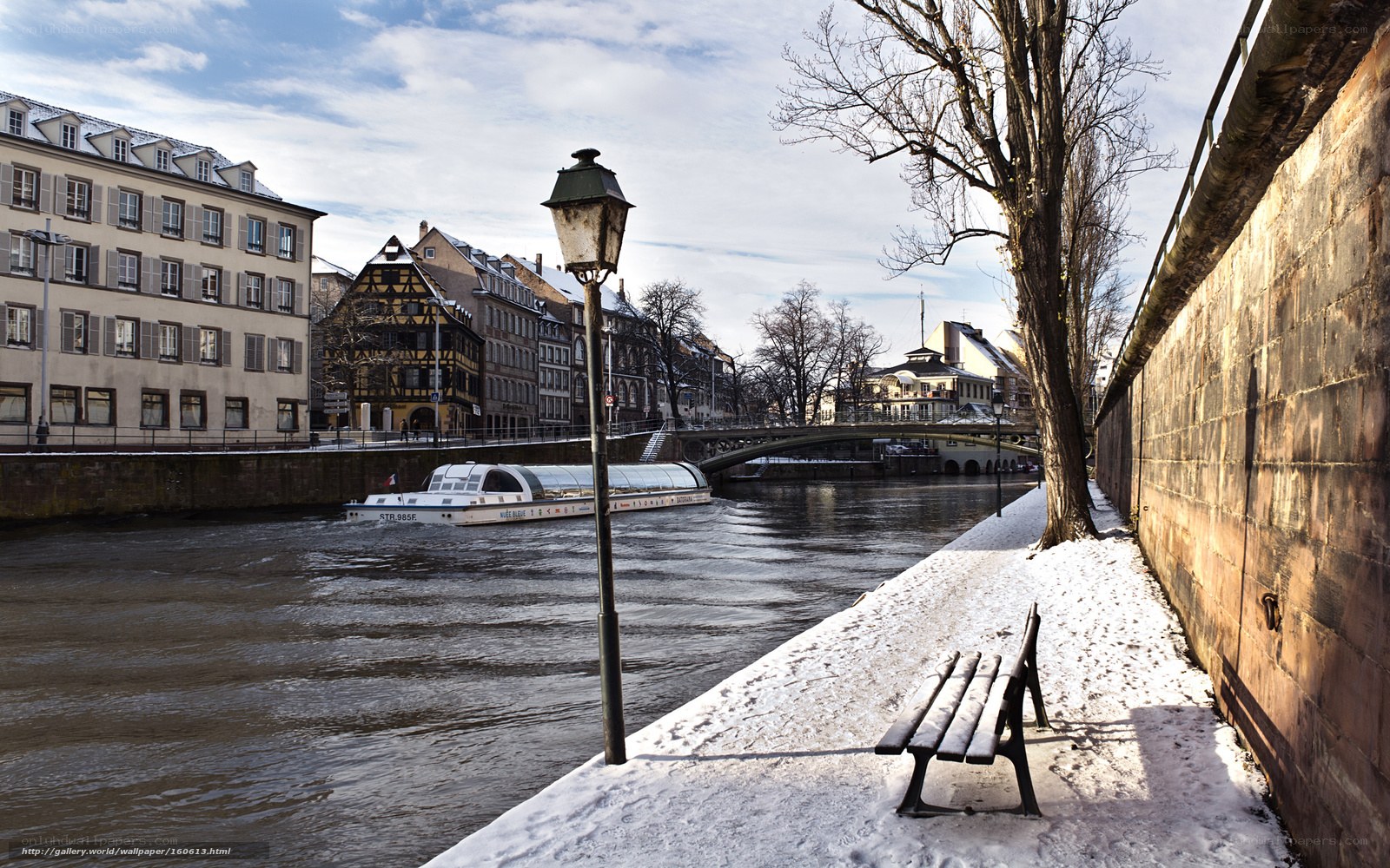 Snowy river scene in Strasbourg
