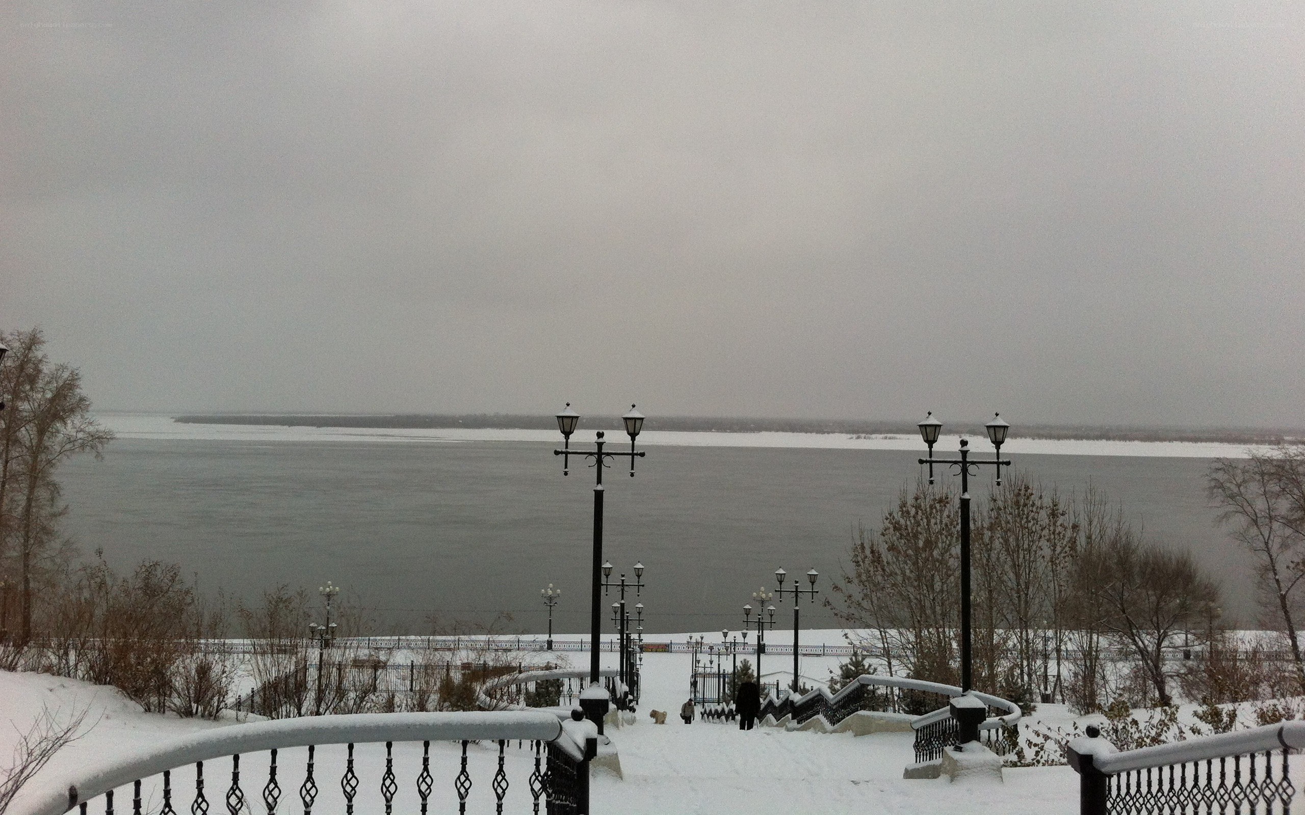 Snowy river view from park
