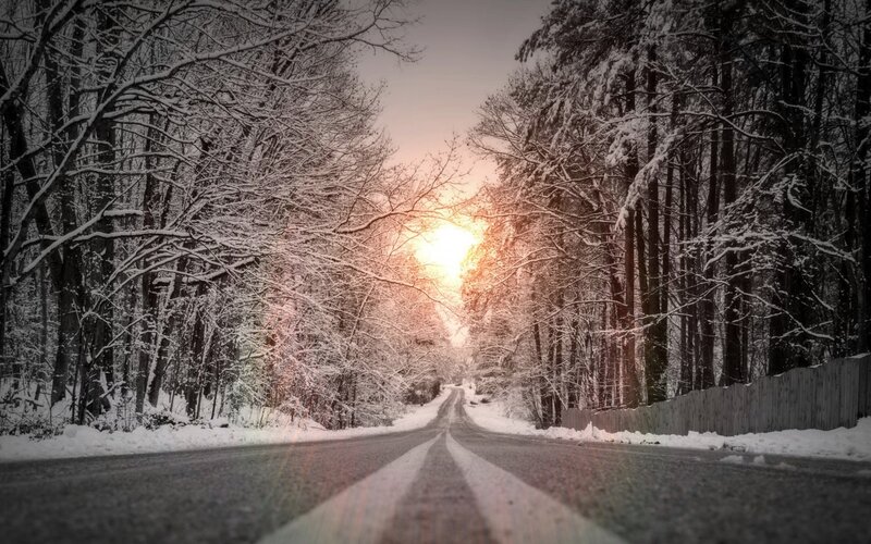 Snowy Road at Sunset