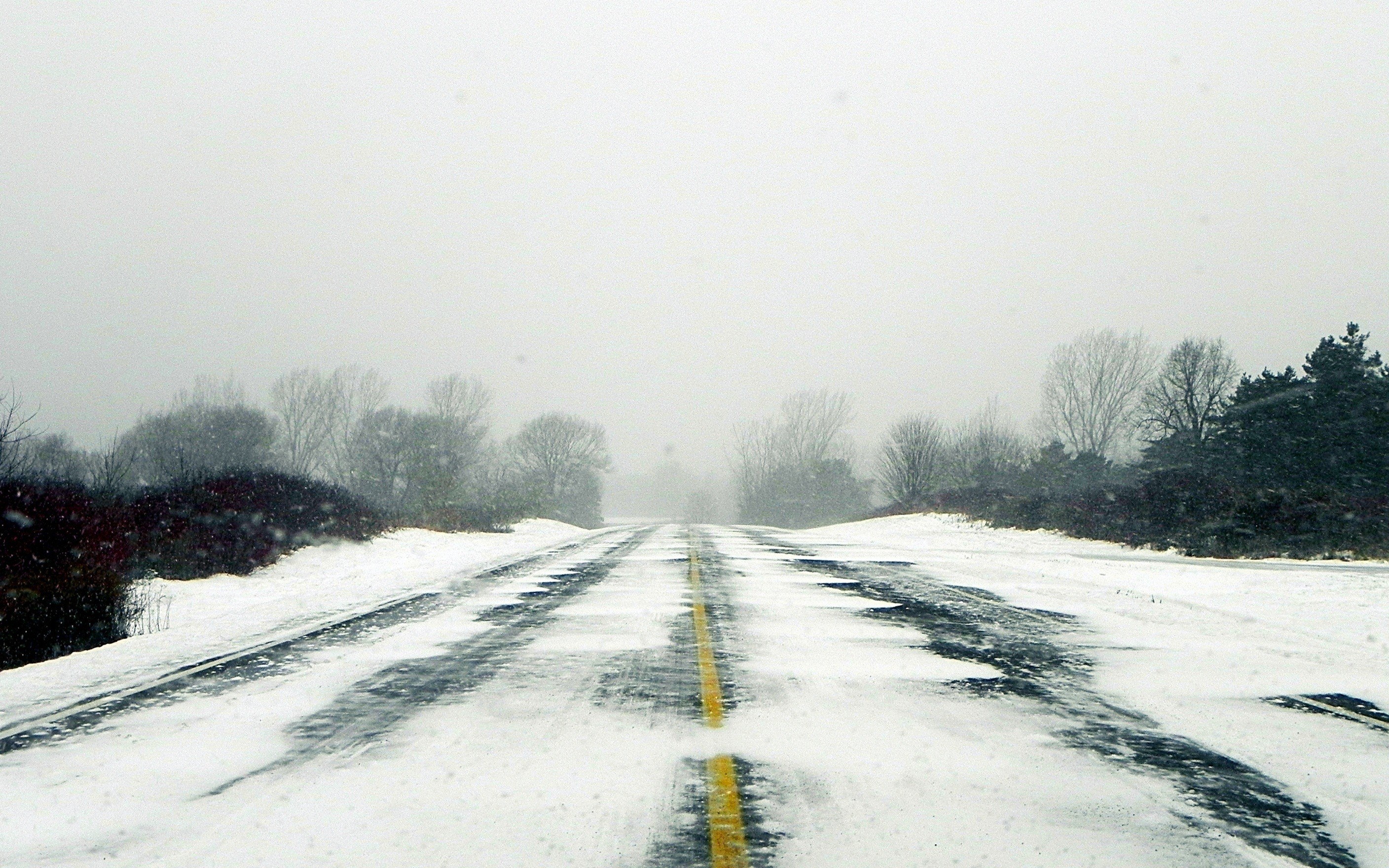 snowy road during a snowstorm