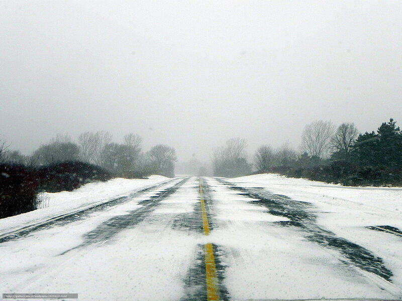 snowy road during a storm