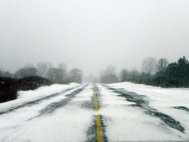 Snowy road during a winter storm