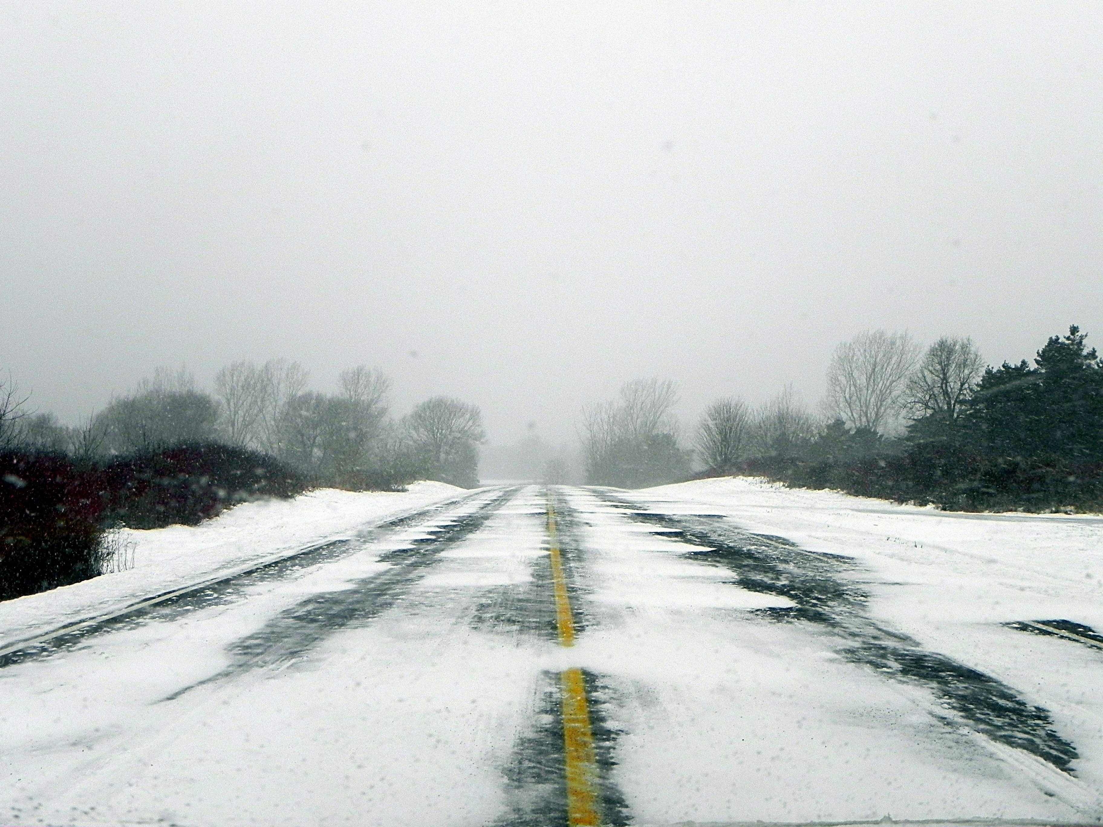 Snowy road during a winter storm