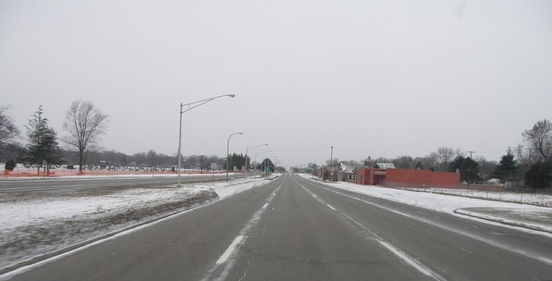 snowy road in a small town