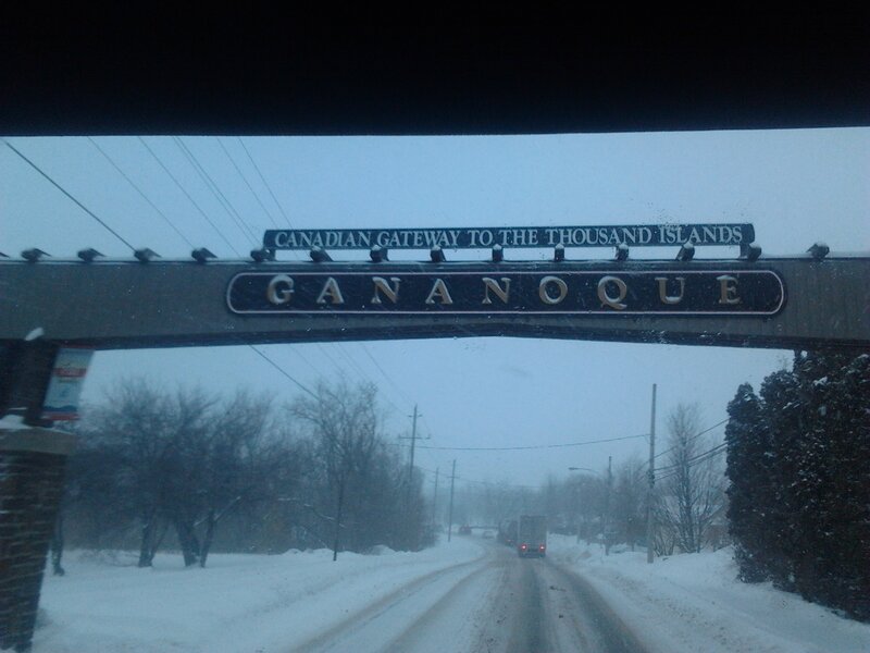 Snowy Road under Sign