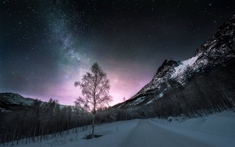 Snowy Road under Stars