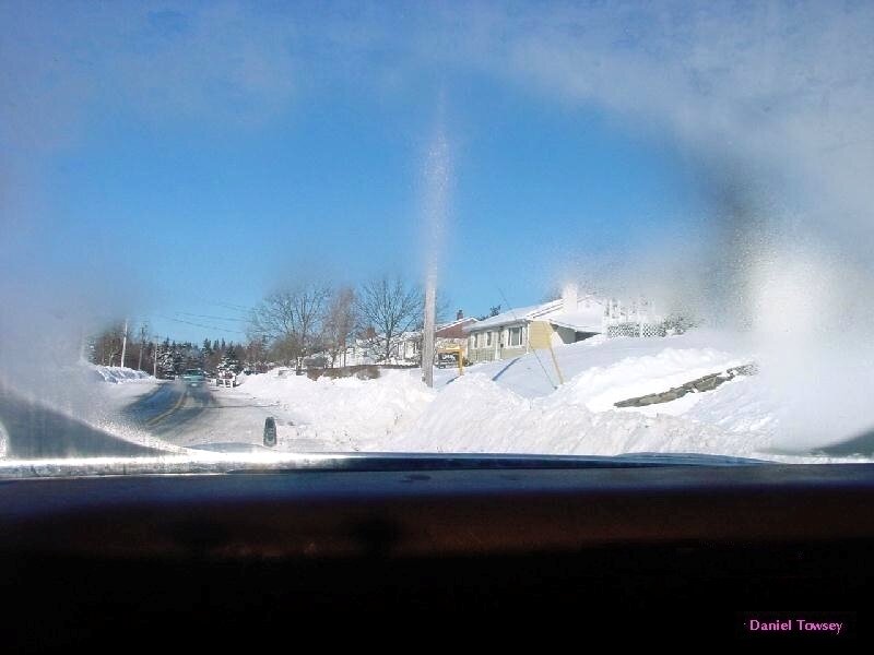Snowy road view from car