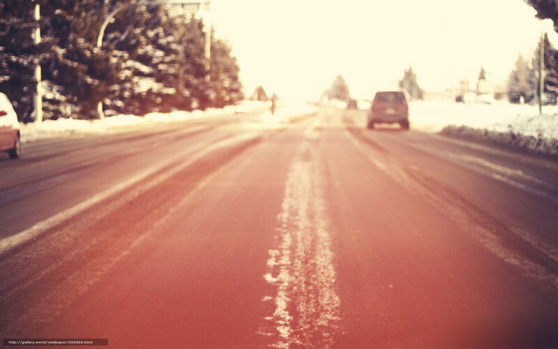 snowy road with cars