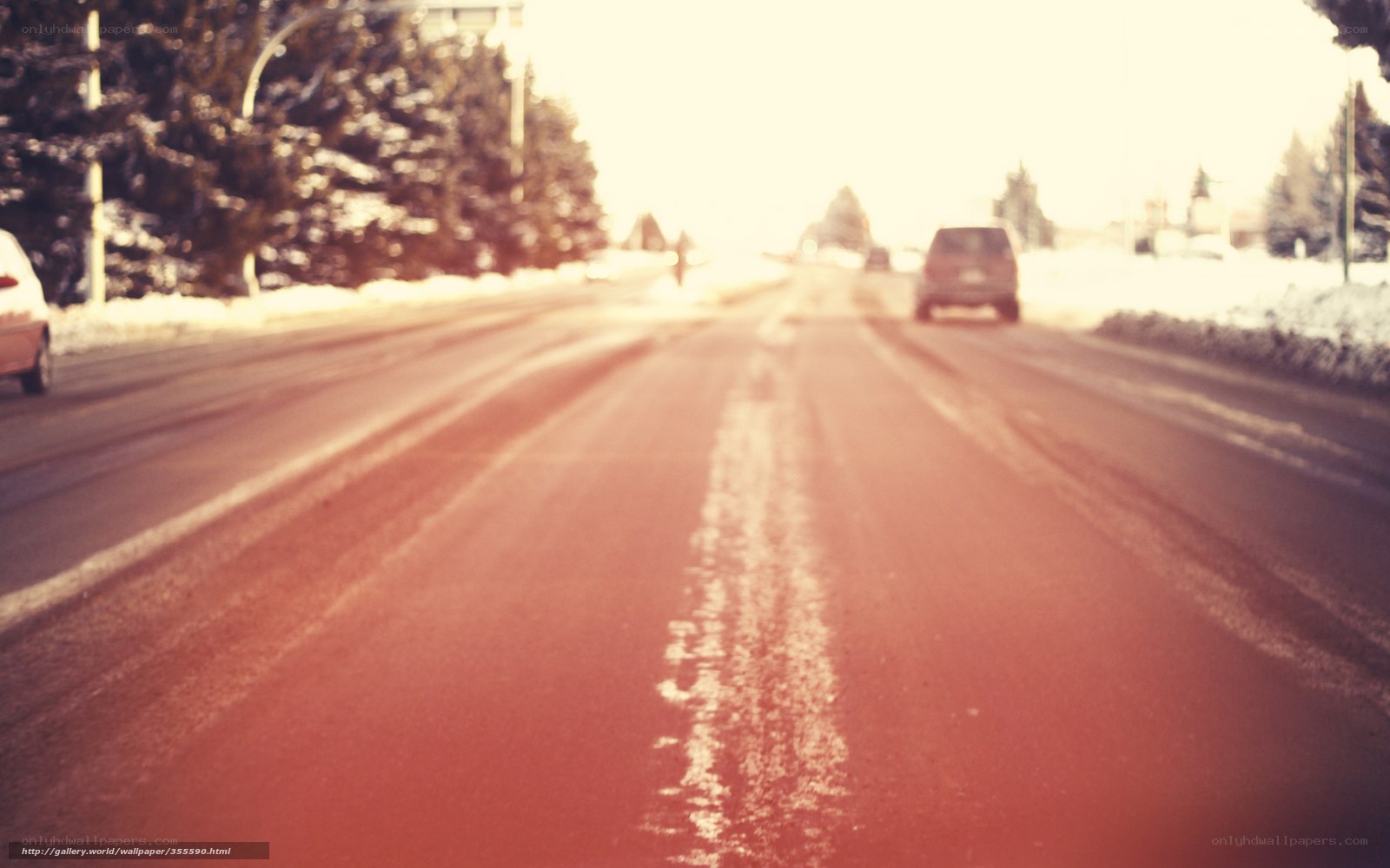 snowy road with cars
