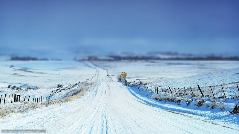 Snowy road with dead end sign