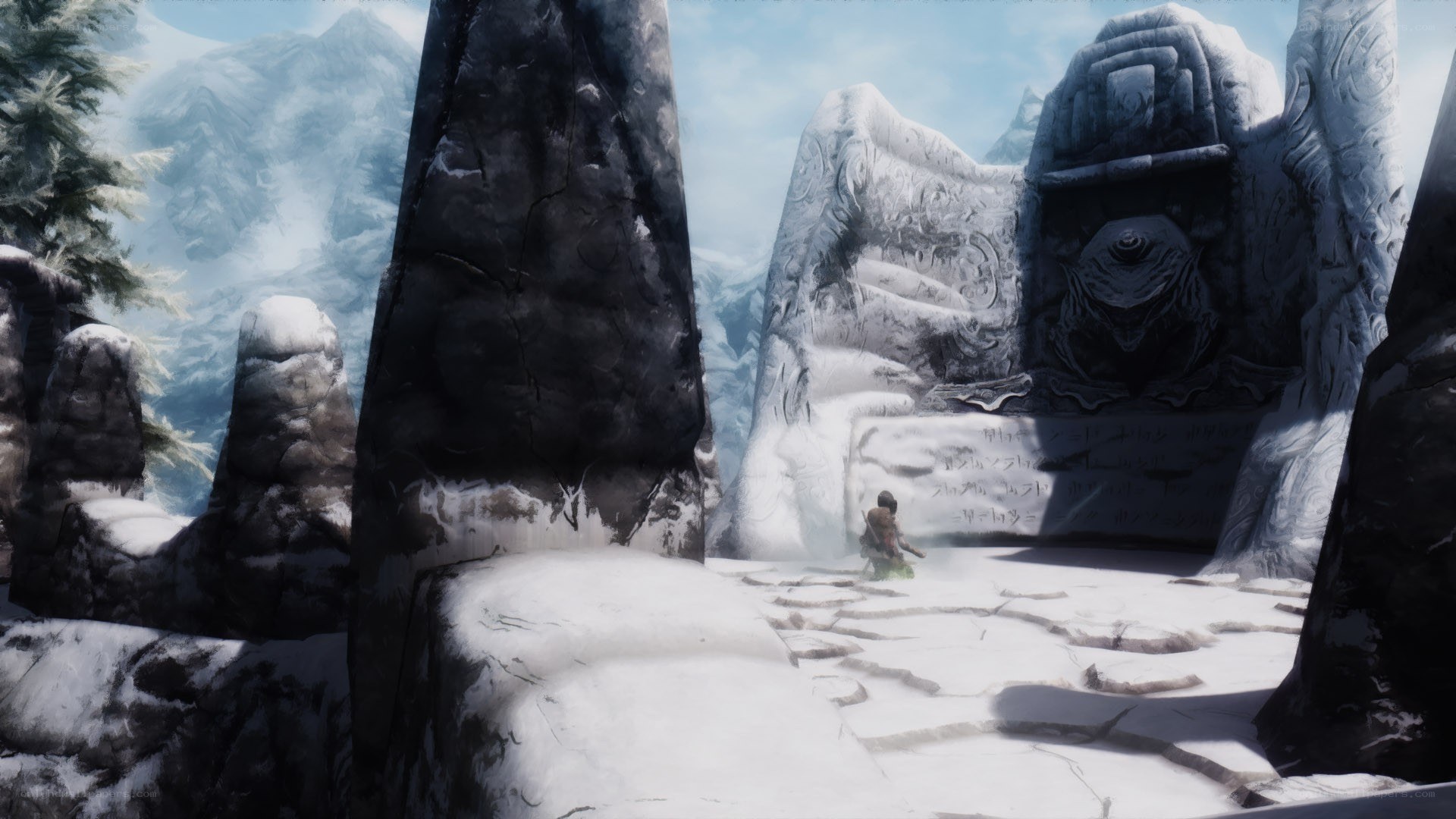 snowy ruin with ancient statue