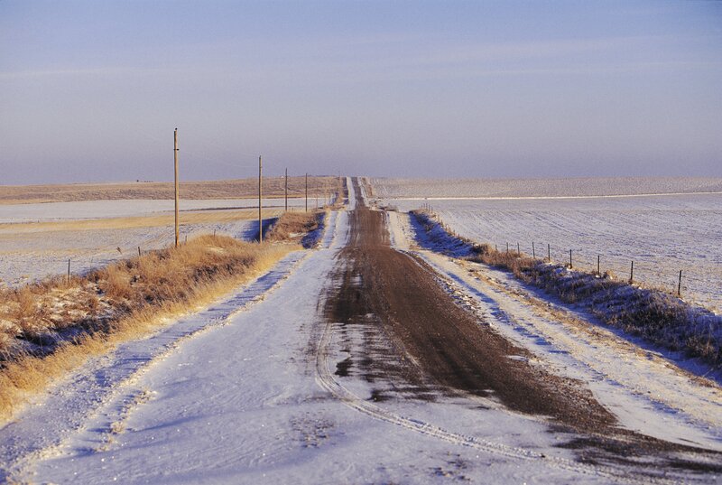 Snowy rural road in winter