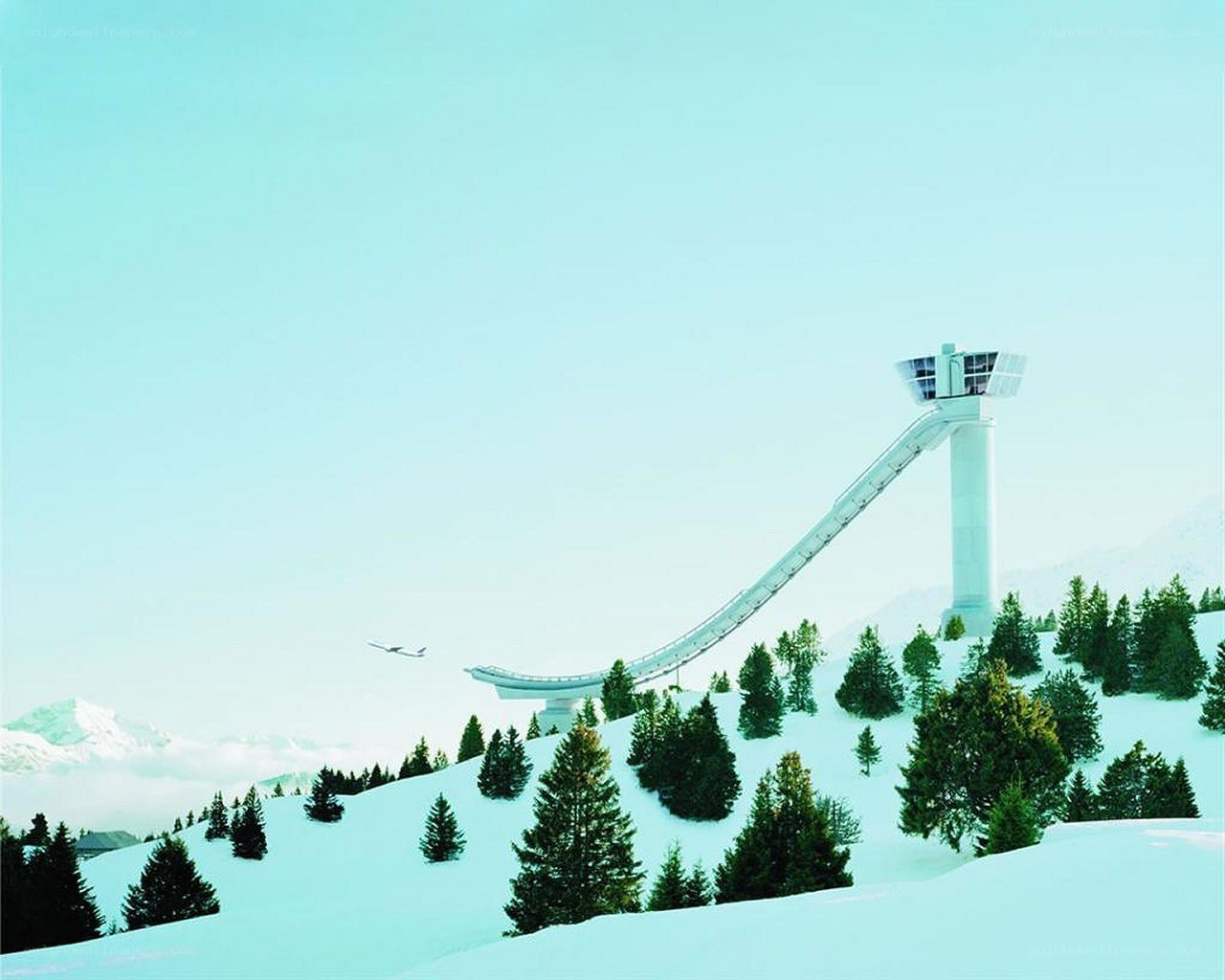 Snowy ski jump in mountains