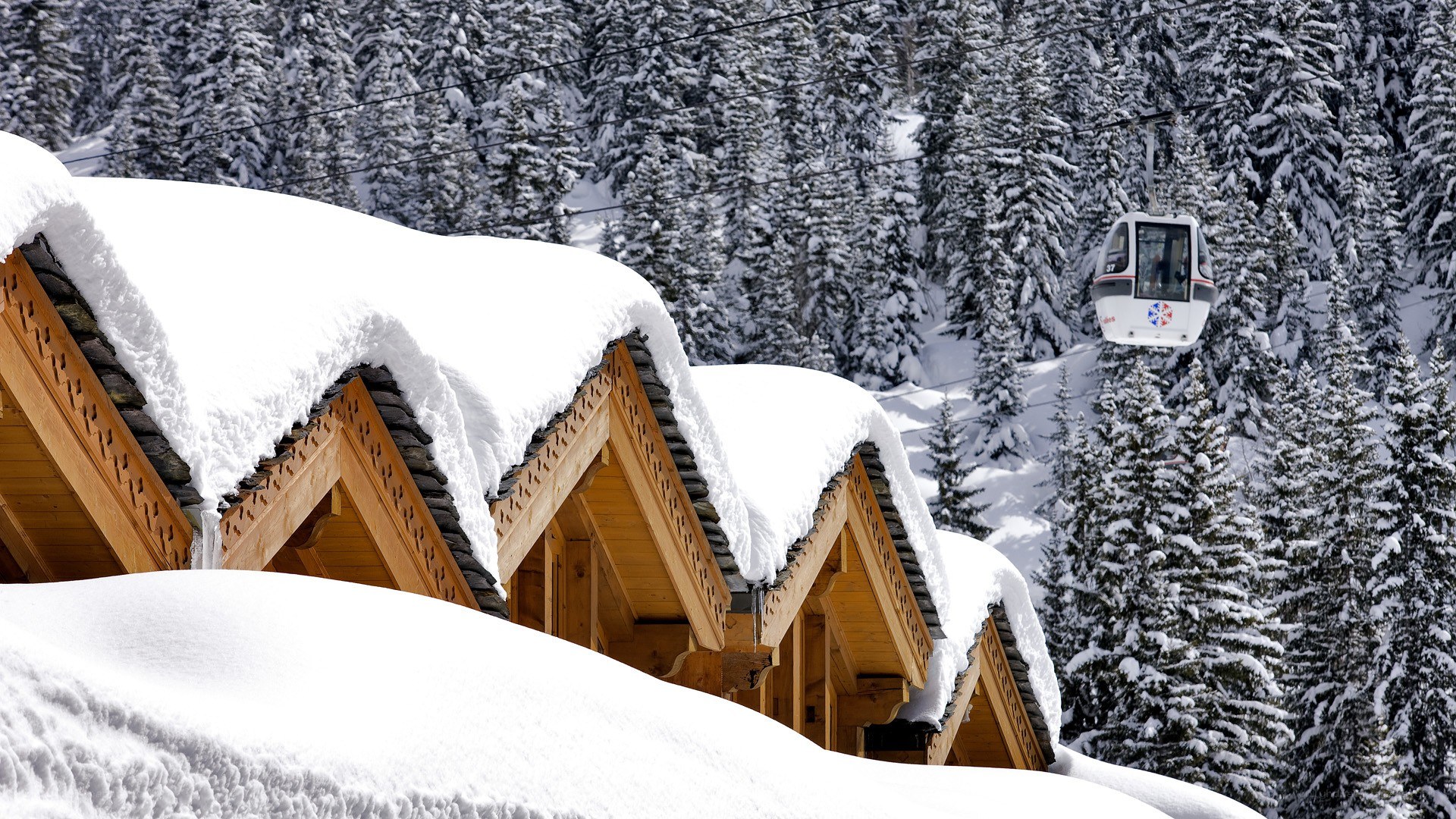 Snowy ski resort with cable car