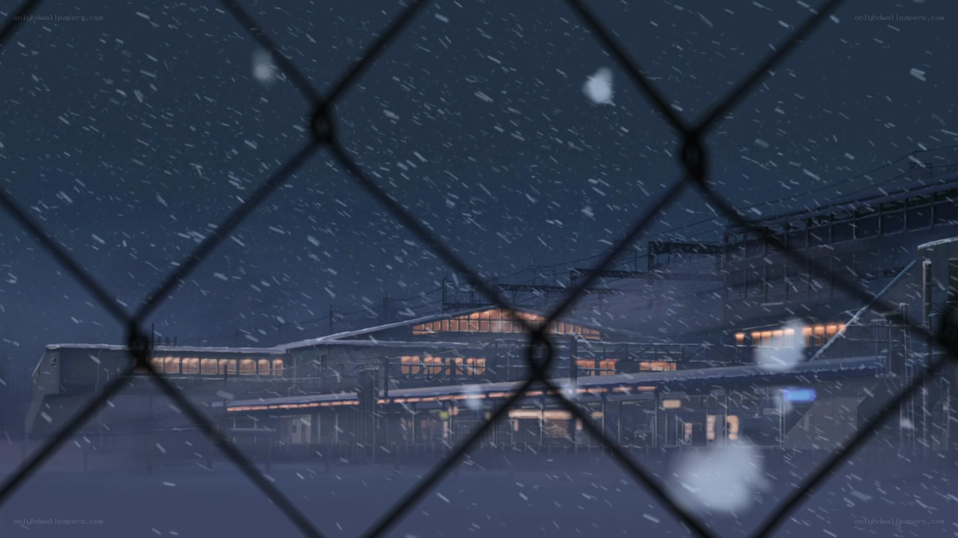 snowy station at night
