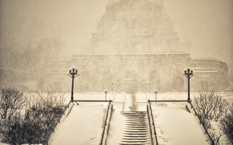 Snowy steps to a grand building
