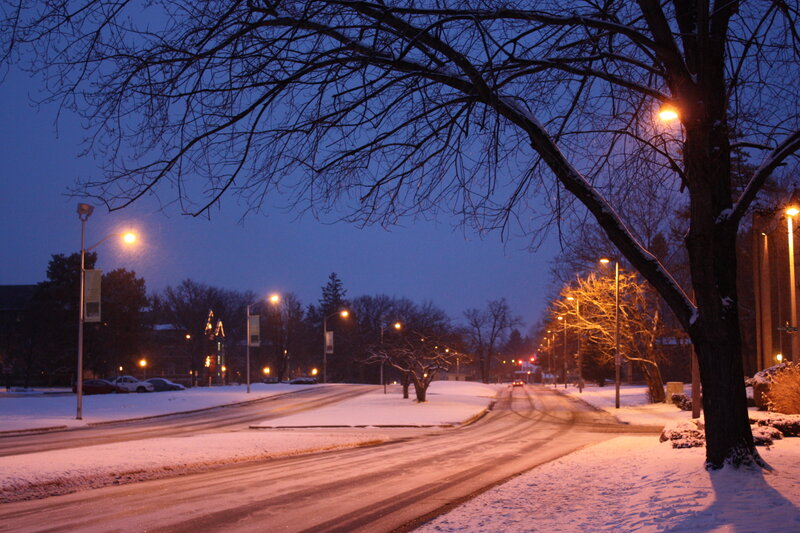 Snowy street at dusk
