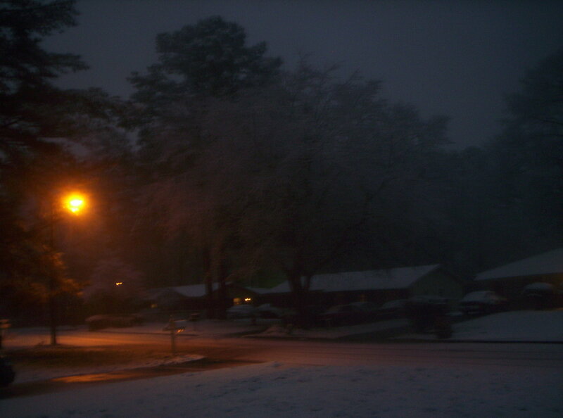snowy street at night