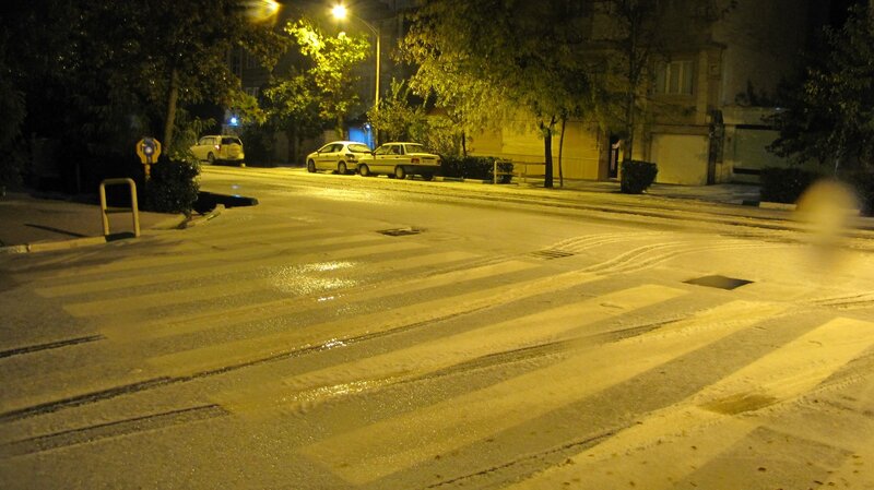 snowy street at night