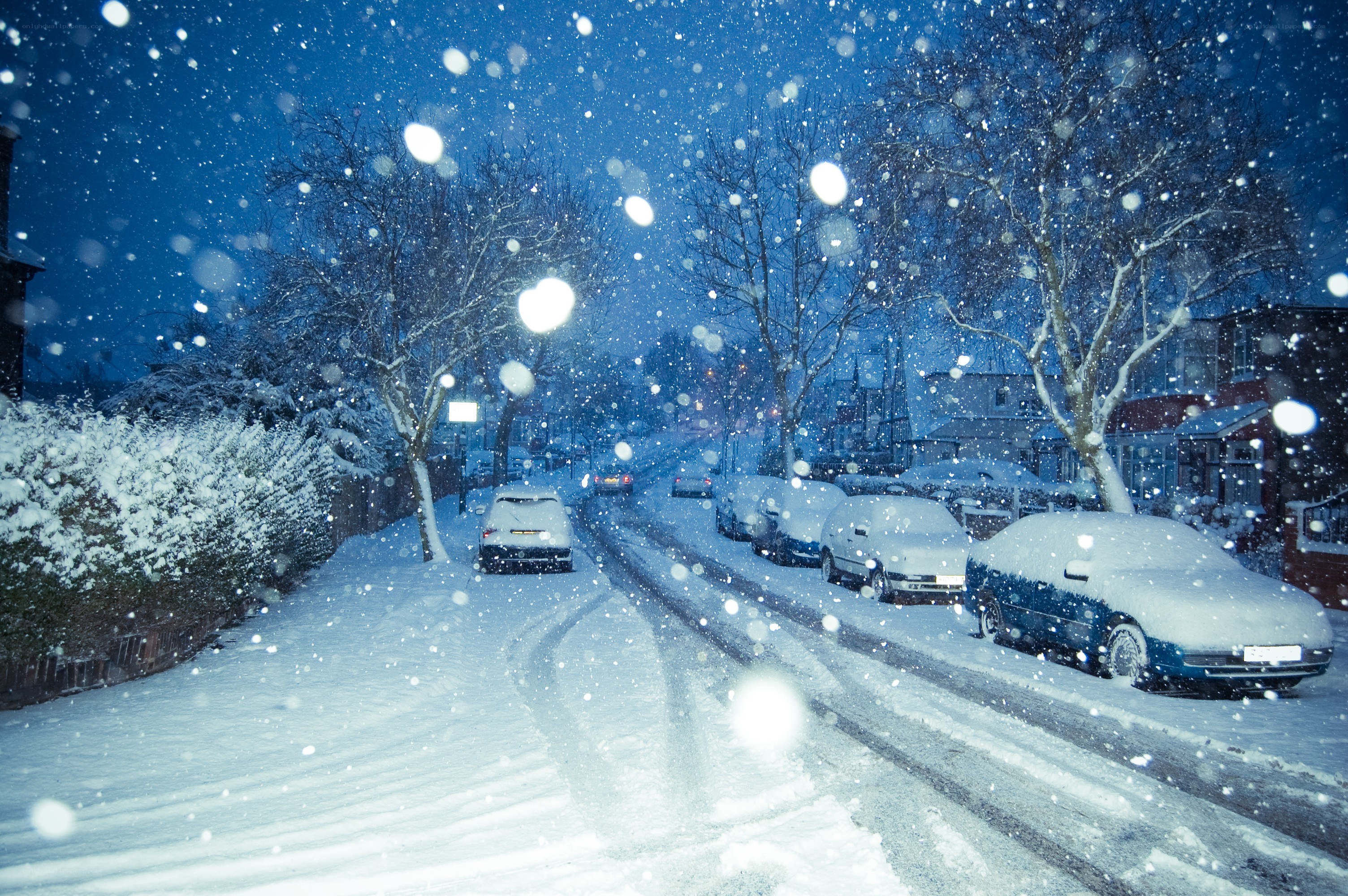 Snowy street at night