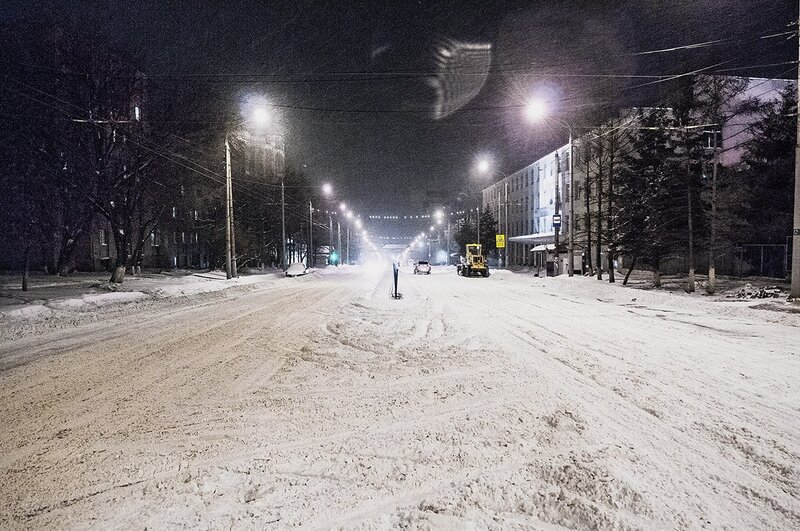 snowy street at night