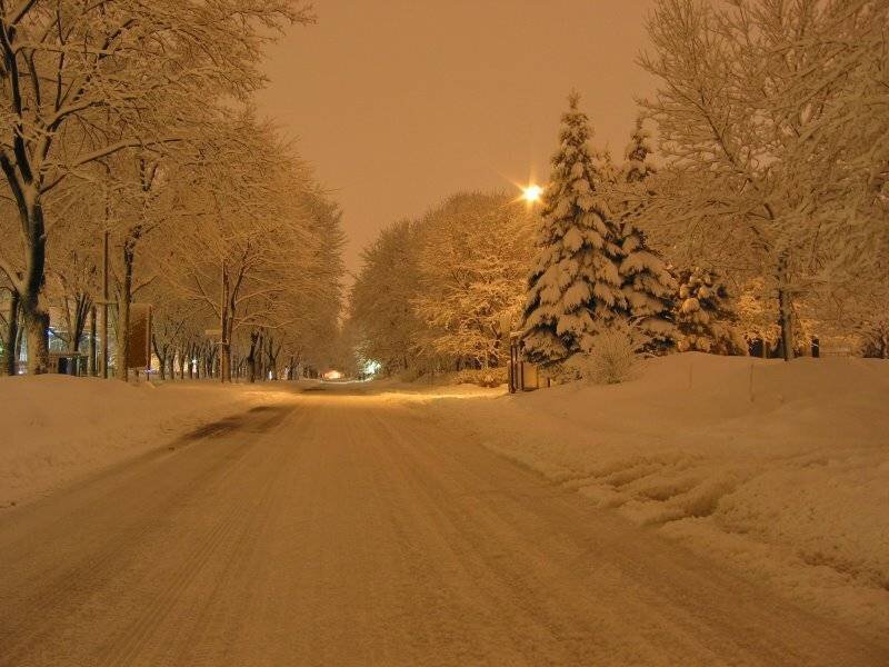 snowy street at night