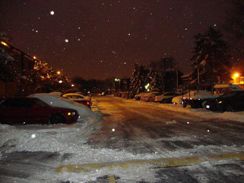snowy street at night