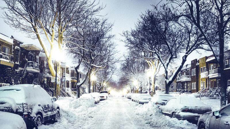 Snowy street at night