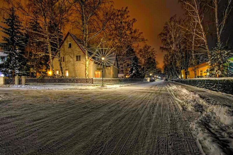 Snowy street at night