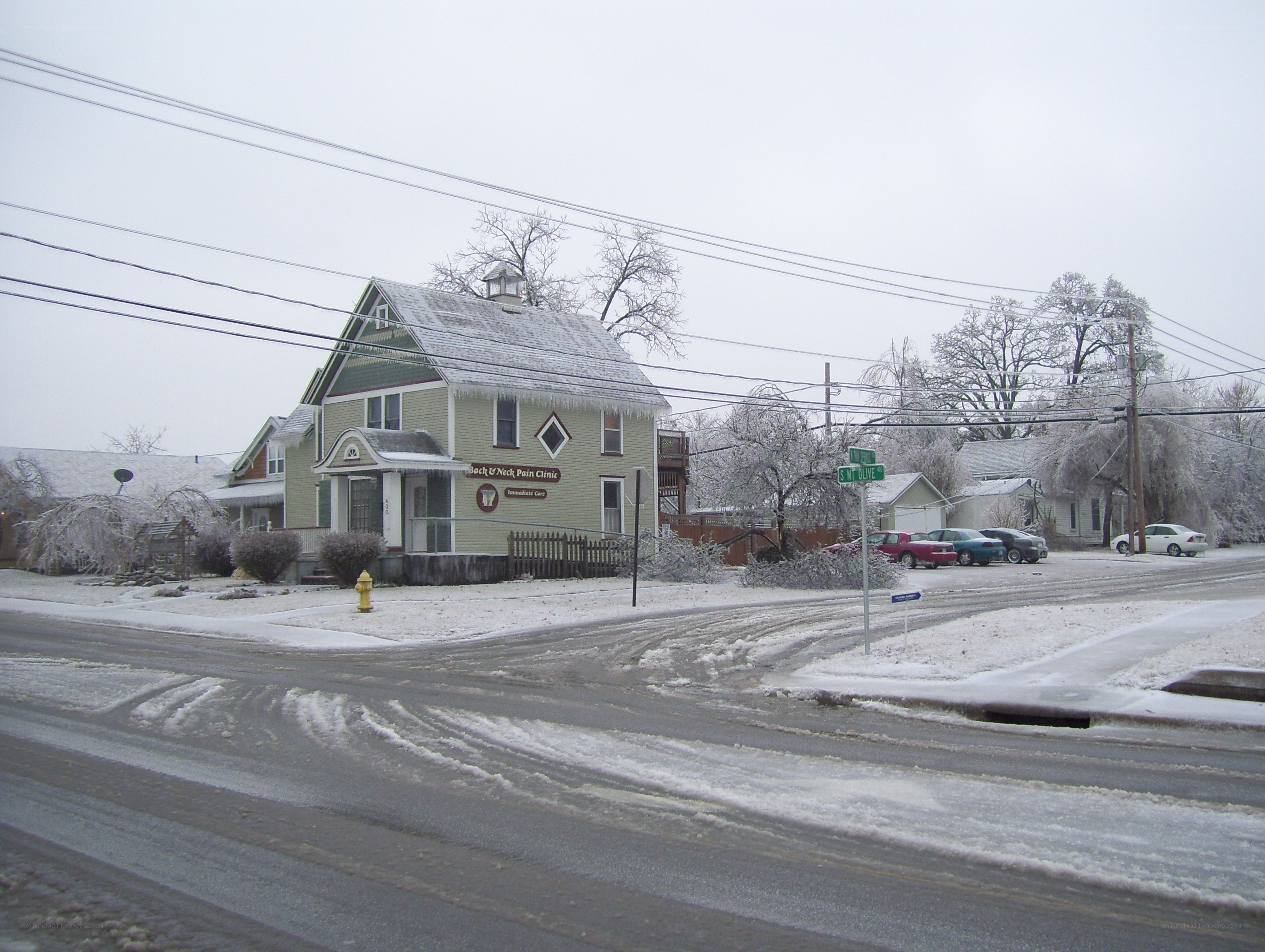 snowy street corner with clinic