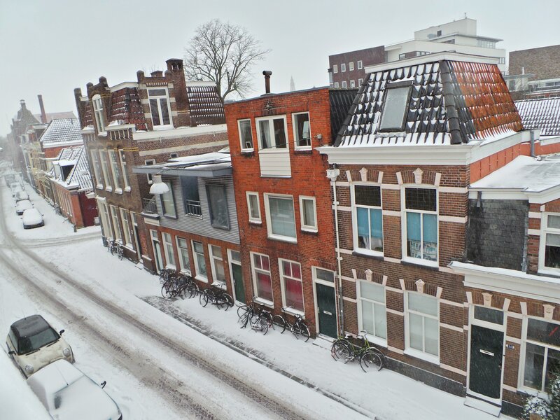 Snowy street in Dutch town