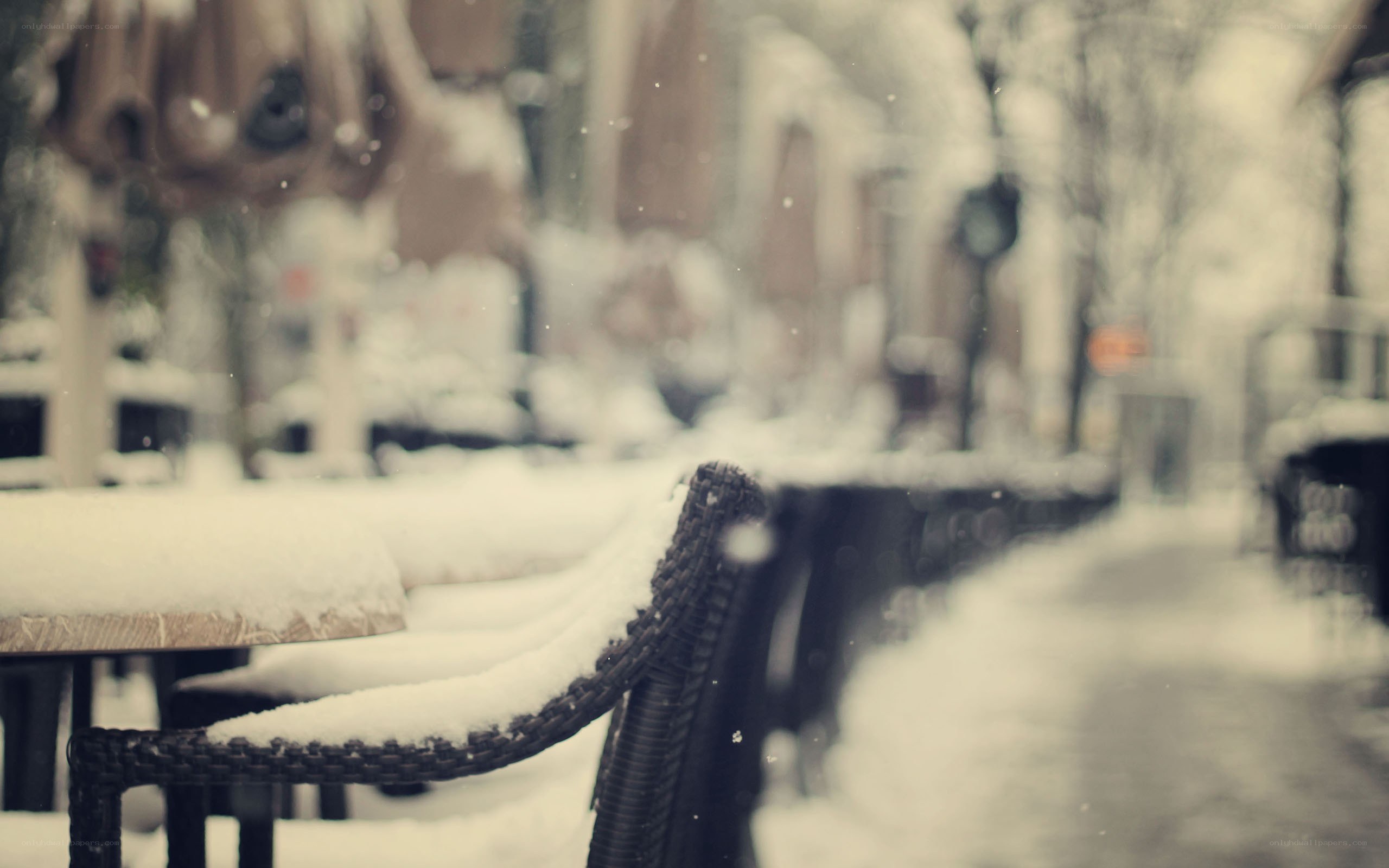 Snowy street with benches