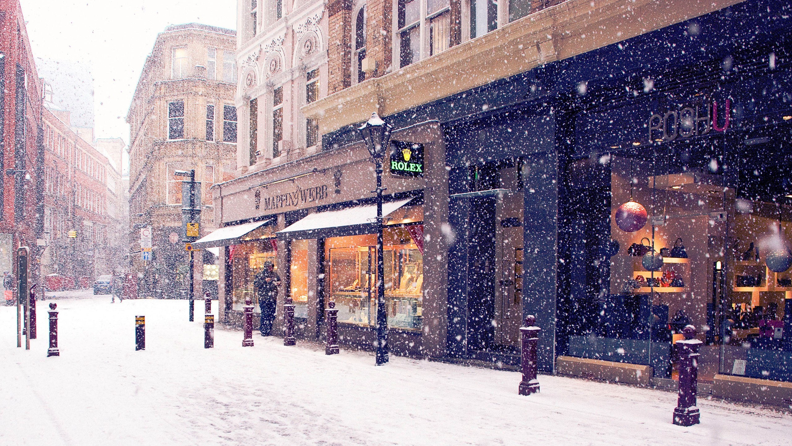 Snowy street with shops