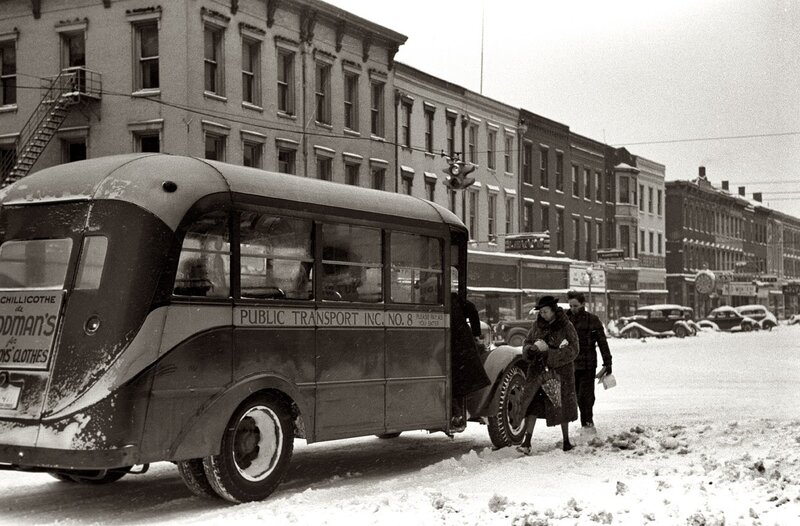 Snowy street with vintage bus
