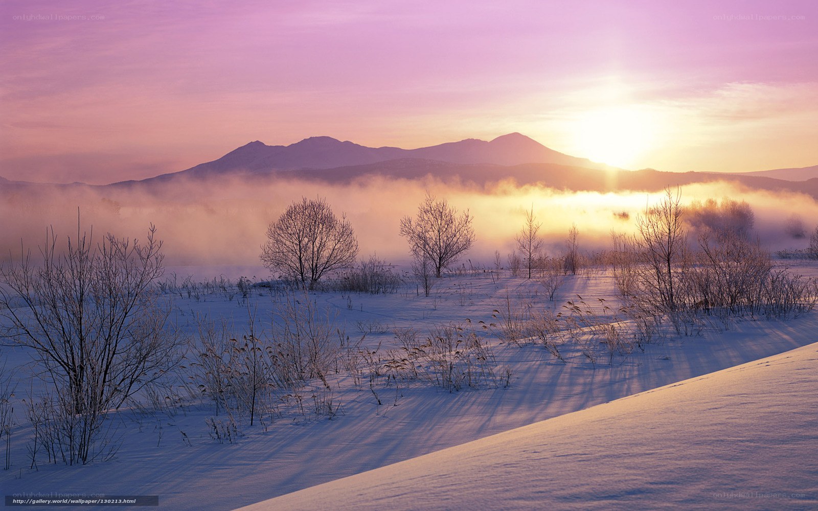 Snowy sunrise over mountains