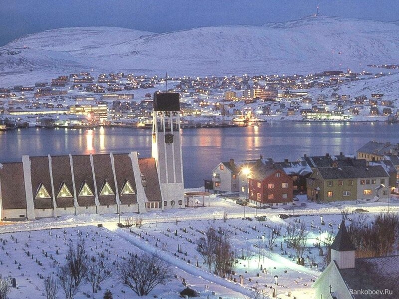 Snowy town at dusk