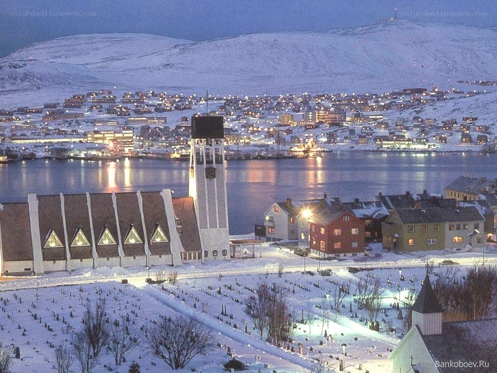 Snowy town at dusk
