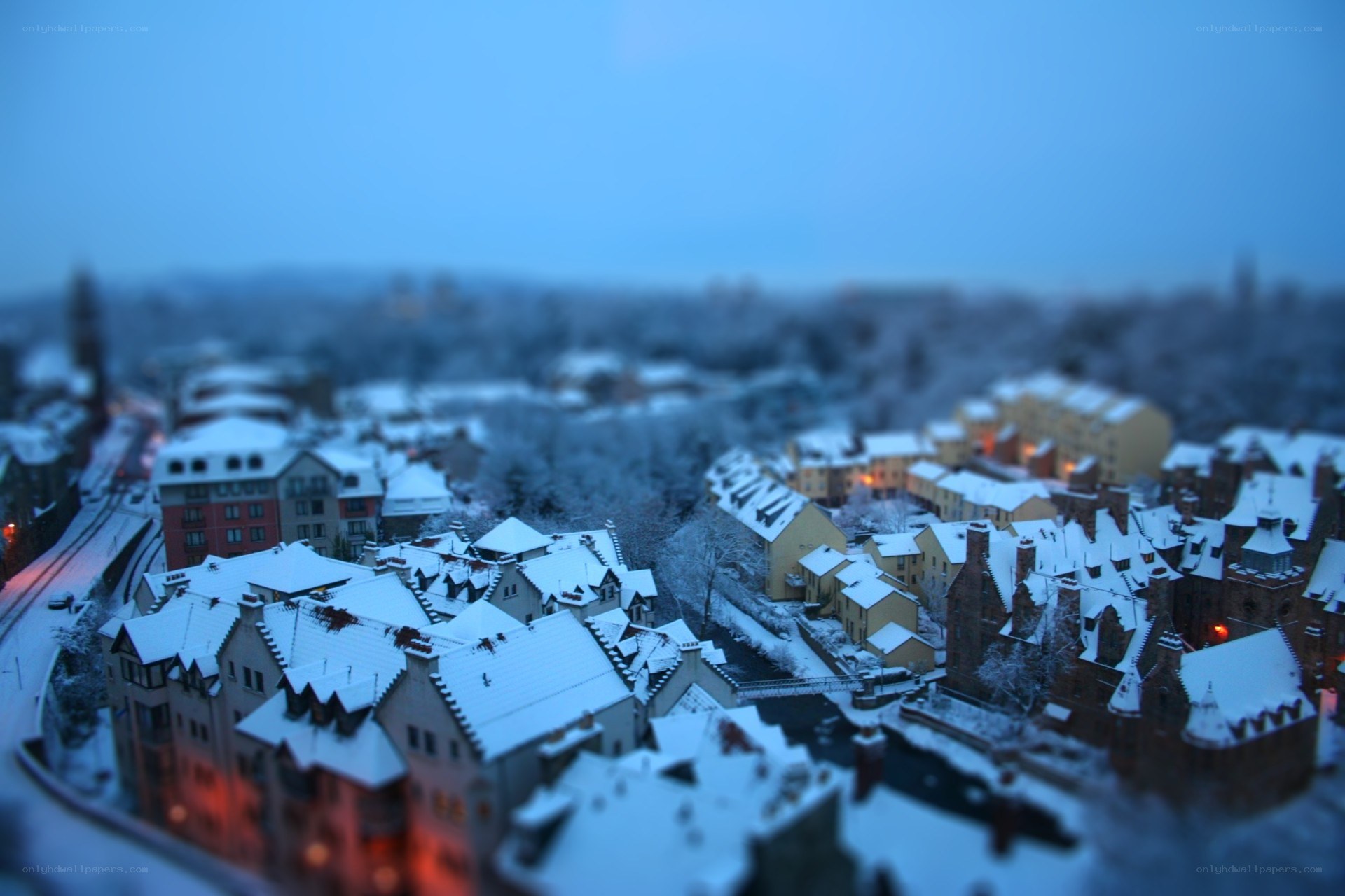 Snowy town at dusk