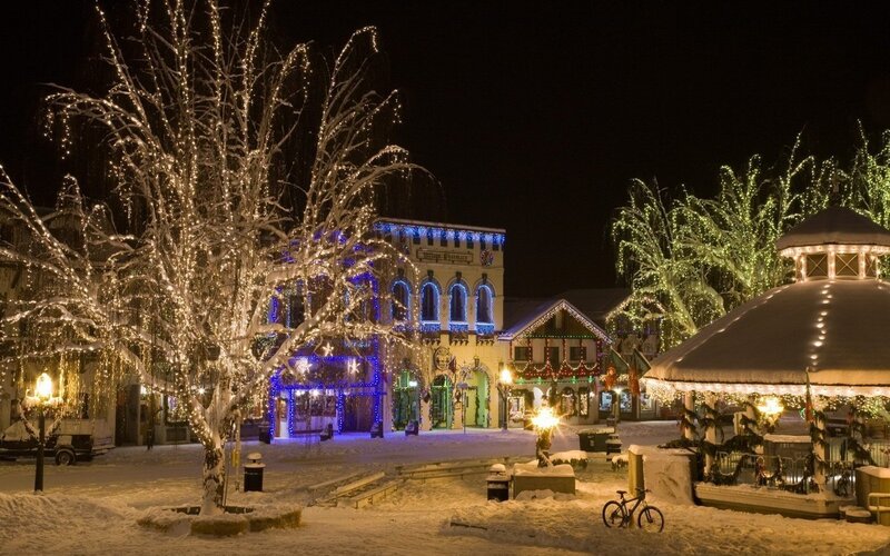 Snowy town at night with lights