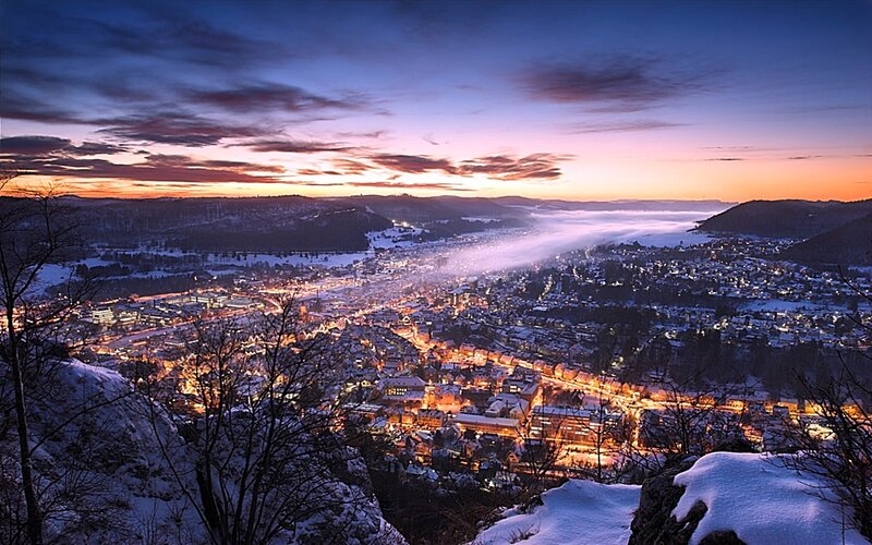 snowy town at sunset